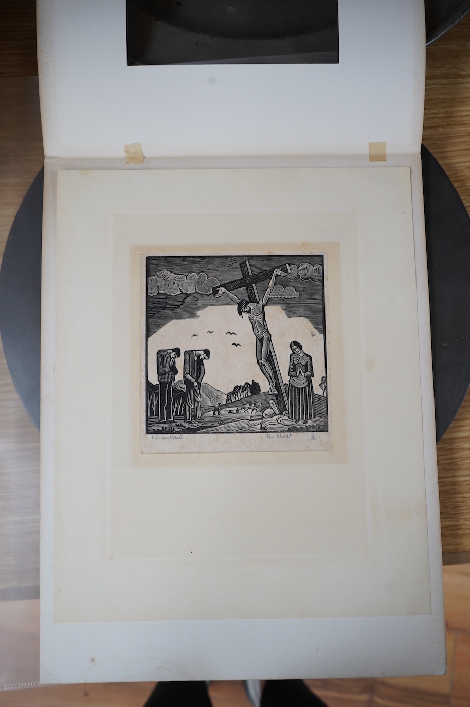 Ethelbert White (1891-1972), wood engraving on paper, 'The Christ', signed in pencil, 2/50, 13 x 13cm, unframed. Condition - some foxing and paper evenly discoloured, Sheet 17 x 17cm. Old card mount, tabbed at the top co